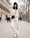 Half-zip knit lounge set in ivory with brown stripes, front view
