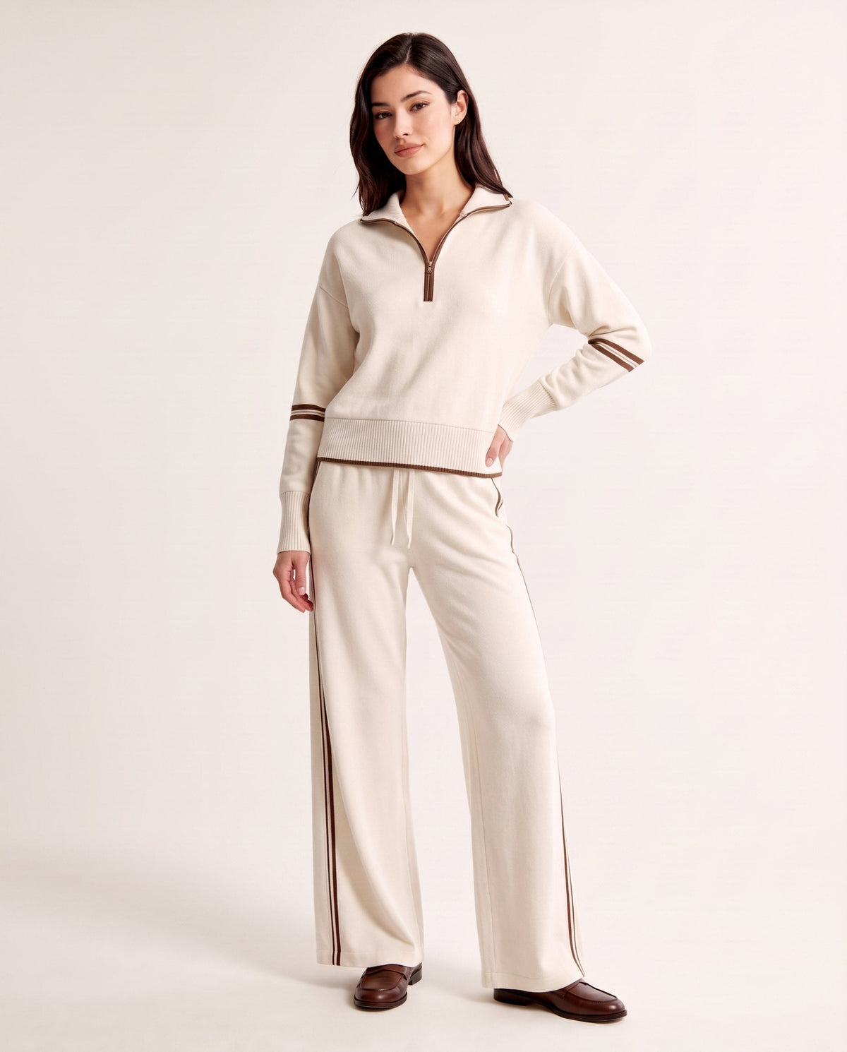 Half-zip knit lounge set in ivory with brown stripes, front view